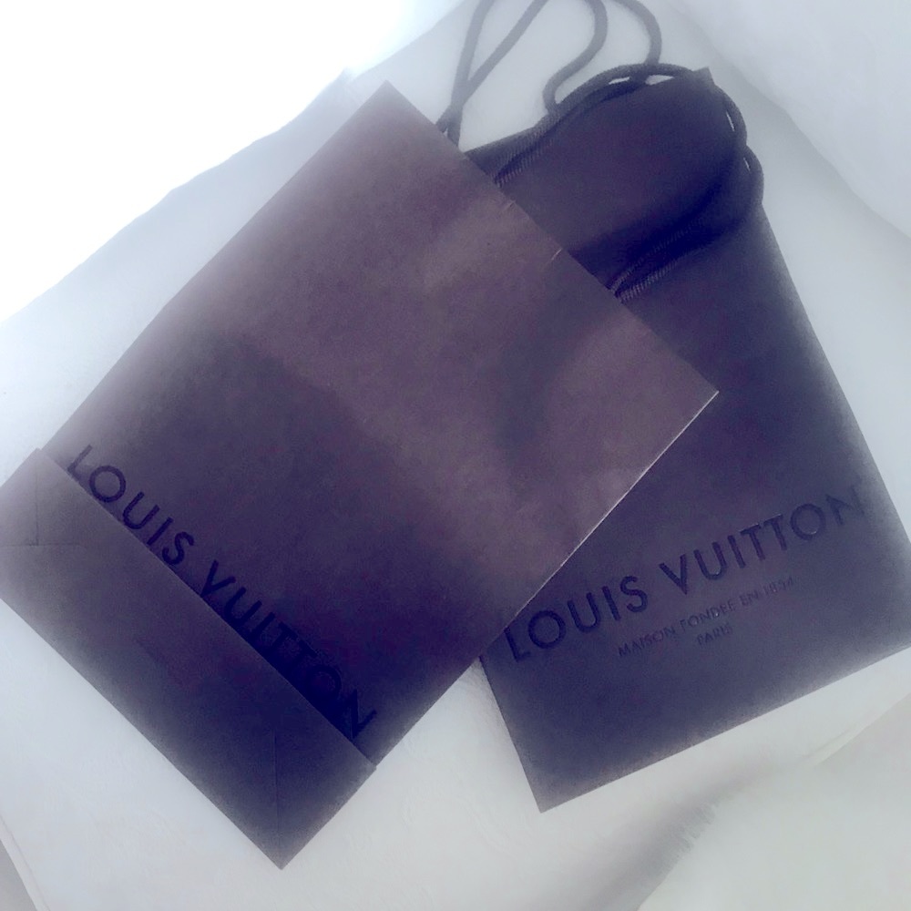 Louis Vuitton small shopping bags new if interested I have other designer bags